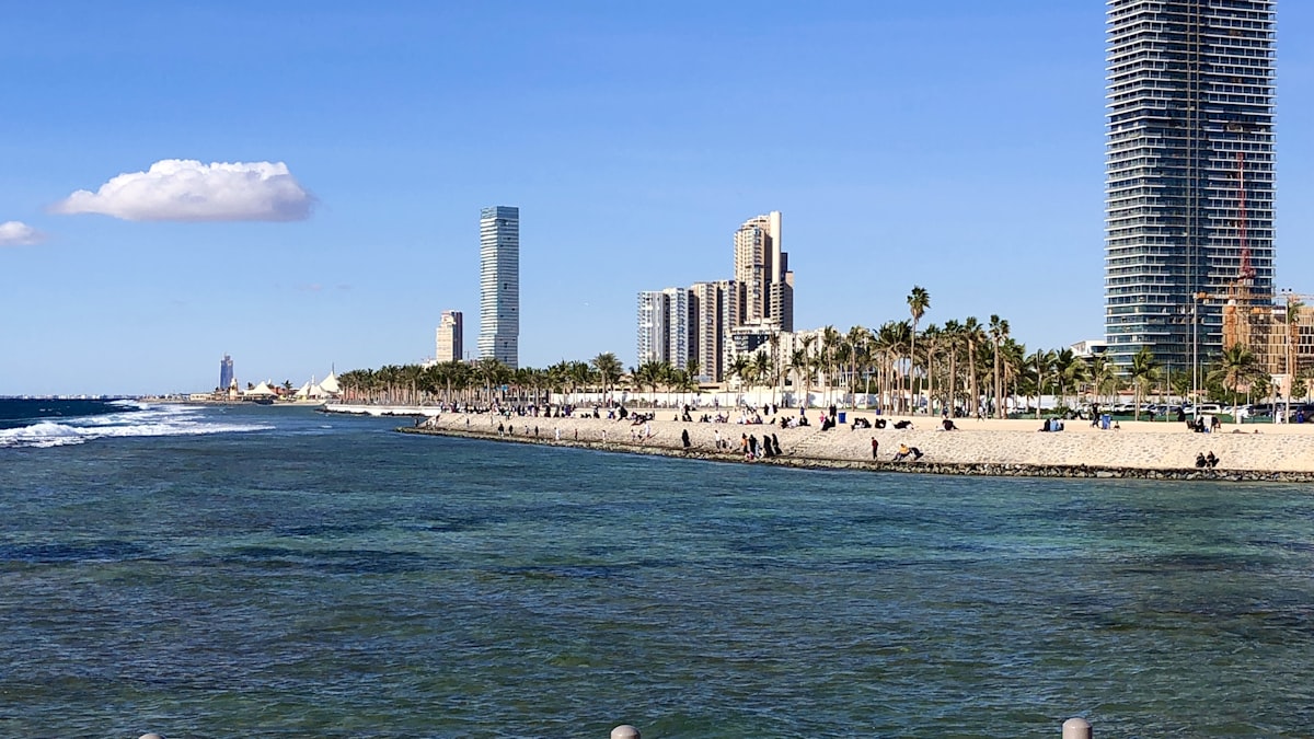Aerial view of Jeddah coastline with neighborhood rental price overlay
